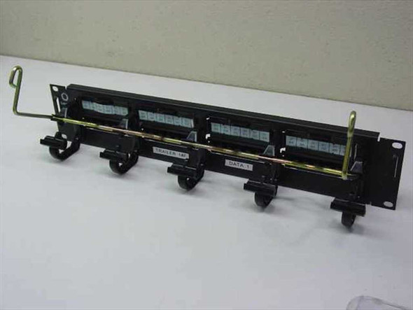 Lucent 110 rackmount patch panel front angled view showing three wiring modules and cable management hooks