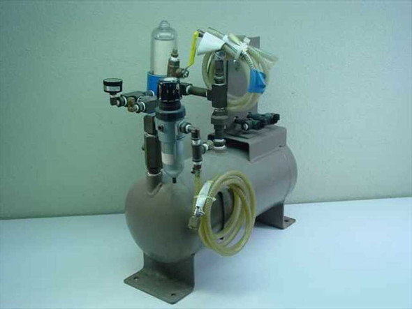 Brunner Engineering Air Station Tank rear/side view showing pneumatic fittings, tubing connections, water separator bowl, and yellow air hose