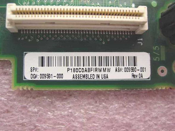 Compaq 009591-000 label closeup showing SP# P180C0ABF1RWMW, AS# 009590-001, DG# 009591-000, Rev 0A, Assembled in USA