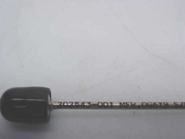 Close-up of cable label showing part number 202543-001 and manufacturer code near black end cap