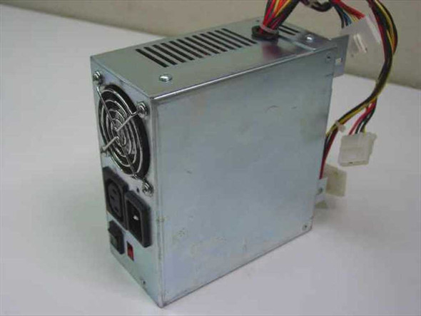 AST Research AST-100 230079-001 100W AT power supply – front and left side view showing cooling fan and IEC inlet