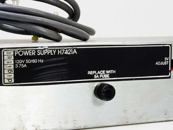 DEC H7421A power supply label closeup showing 120V 50/60Hz 3.75A rating and 5V Adjust marking
