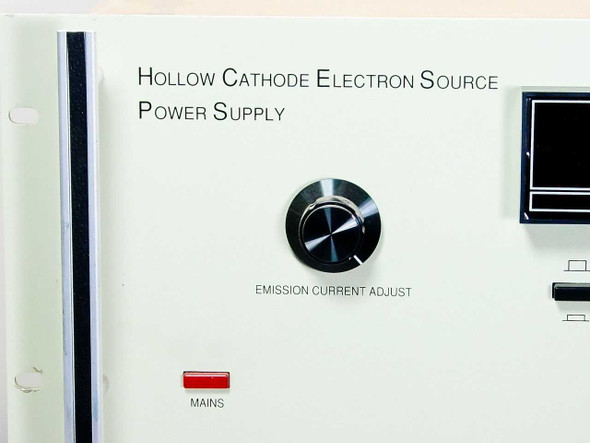 Commonwealth Scientific HCES 5000 front panel close-up showing Emission Current Adjust knob, Mains indicator lamp, and product label