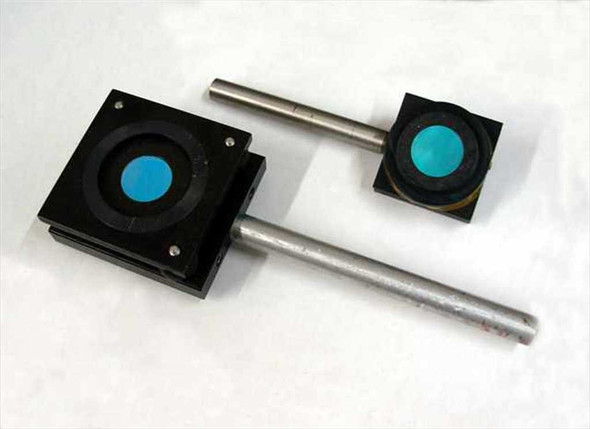 Oriel coated optical mirror anti-vibration mounts — both mounts side by side showing blue-coated mirrors and metal stems