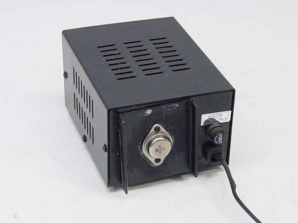 PHC-412J Regulated DC Power Supply right side and rear showing external power transistor heat-sinked to chassis, AC power cord, and blade fuse holder
