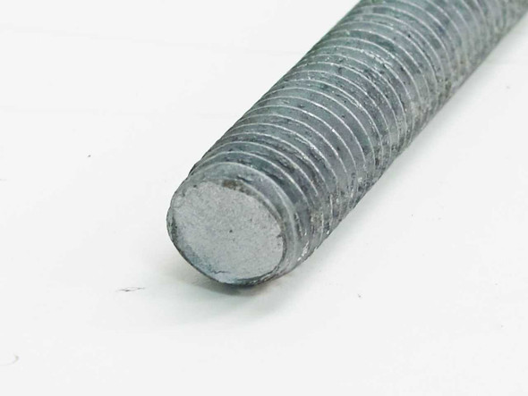 Close-up of end of galvanized 5/8"-11 all thread rod showing thread profile and flat tip