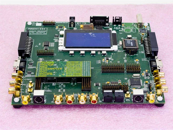 Philips Semiconductors MACH-III Minimodule Advanced Carrier Hardware — top view showing LCD display, SMA connectors, FPGA array, and pin headers