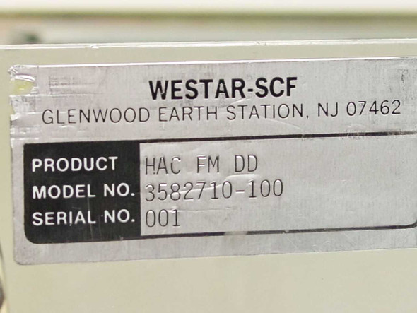 Hughes 3582710-100 Westar-SCF product label showing model number 3582710-100, product code HAC FM DD, and serial number 001
