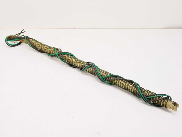 Titan Industrial 4-113-G 5kW 277V coil heating element – full length view showing helical coil body with green and black lead wires