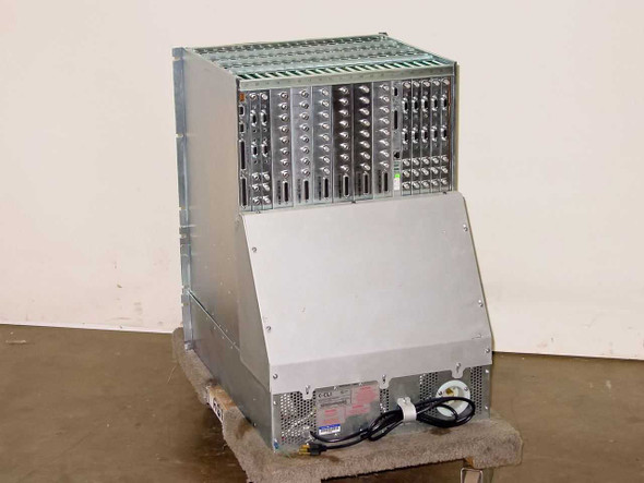 CLI Compression Labs Magnitude 410111-01 multiplexer system — rear three-quarter view showing rear card connectors, lower power supply bay, and AC power cable