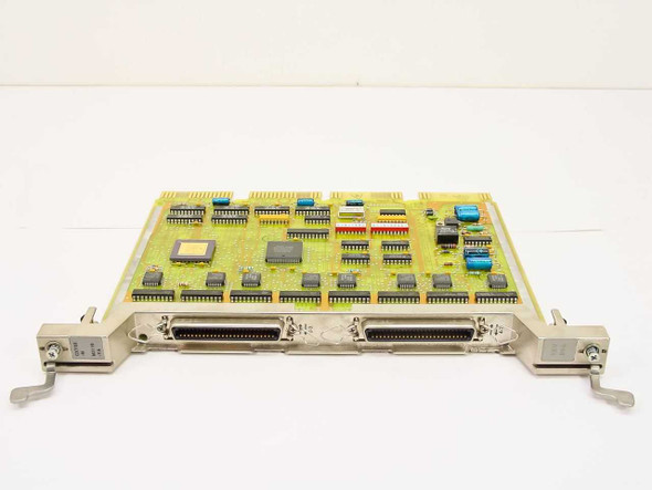 DEC M3119-YA CXY08-M 8-line async serial communication card – angled top view showing PCB and dual DB connectors on front bracket