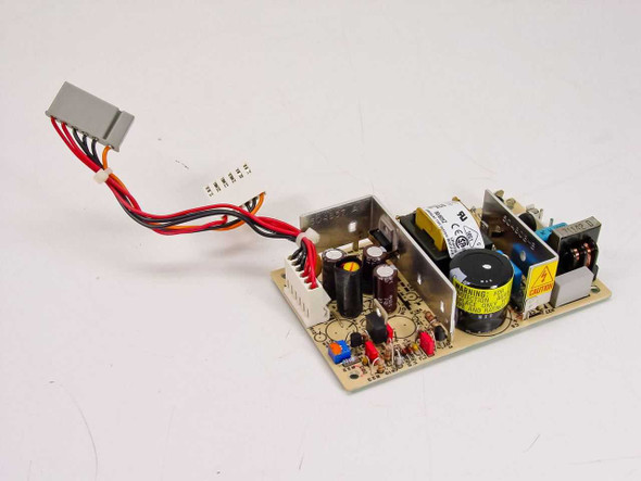 Computer Products NFS40-7912 switching power supply — angled reverse view showing component side and output wire harness connectors