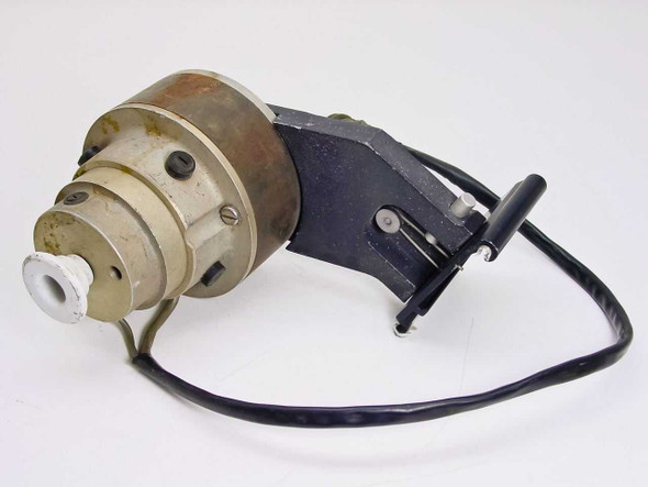 Torque Systems Snapper servo motor 27167-1 front-left view showing motor body, white ceramic output nose, rail-type mounting bracket, and black cable lead