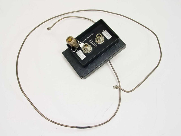 Varian 01000281-00E RF Input Module top view with two attached semi-rigid RF cables and SMA/TNC connectors on black housing