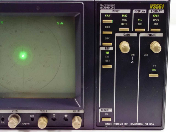 Magni VS561 Vectorscope front panel close-up showing INPUT (CH A, CH B, CH C), DISPLAY (VEC, AUD), FORMAT (CPST, YPbPr, GBR), GAIN and PHASE knobs, REF selector, and REMOTE section with Magni Systems Inc. Beaverton OR USA label