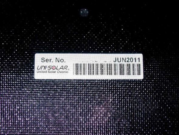 Uni-Solar PVL-144 label closeup showing United Solar Ovonic brand name, barcode, and JUN2011 manufacture date