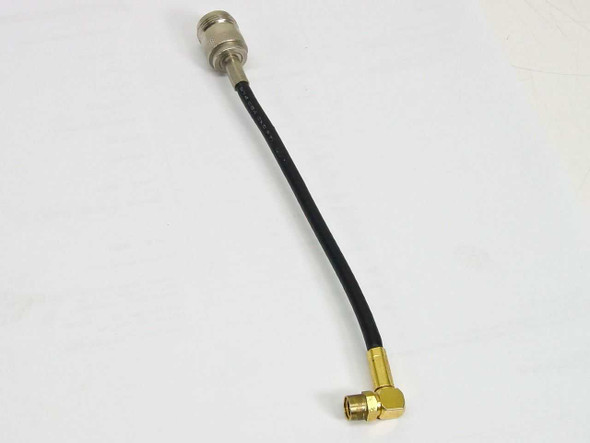 Coaxial RF cable assembly reversed view showing N female connector at top and SMA male right-angle connector at bottom