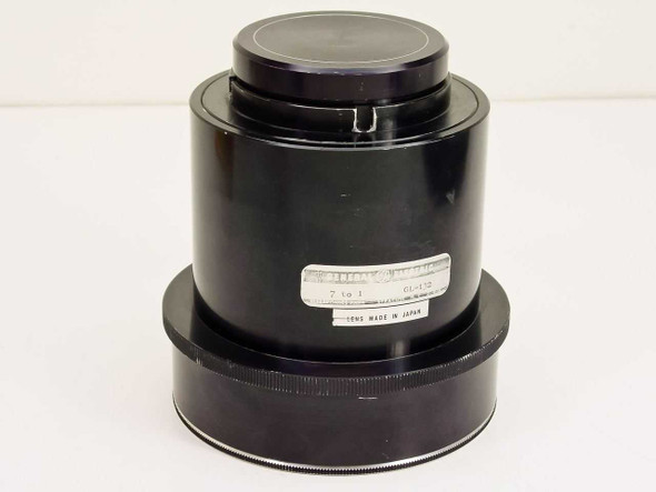 GE General Electric GL-132 7-to-1 projector lens front view with top protective cap installed, label visible on body