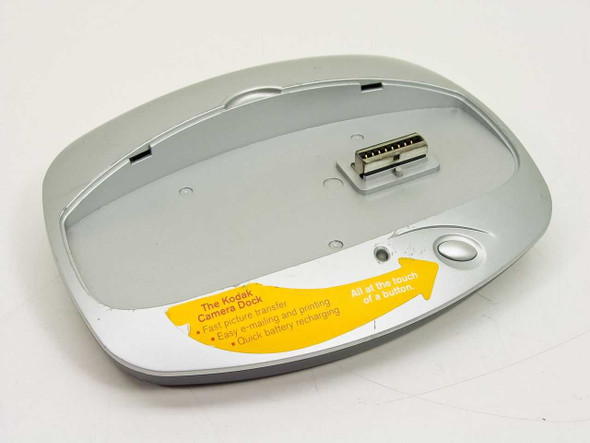Kodak EasyShare Camera Dock top view showing proprietary multi-pin camera connector and yellow product label
