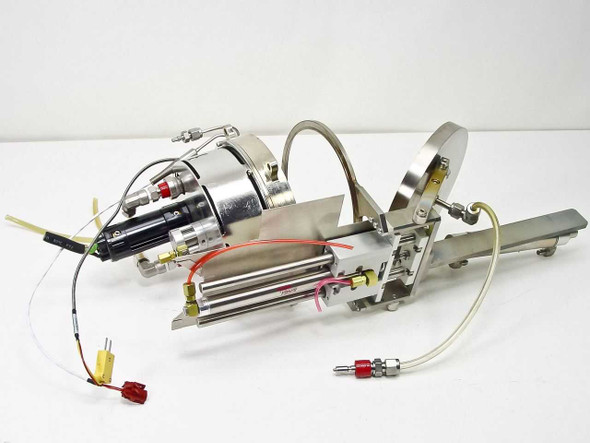 Clippard UDR-17 pneumatic cylinder and Bimba stainless linear guide assembly — opposite side view showing black cylinder actuator, red and yellow tubing, and fittings
