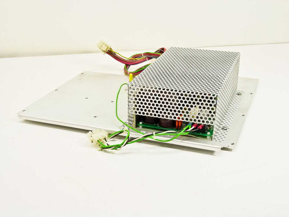 VMX Inc DIAL SA10096-01 340W power supply on mounting tray – angled top view showing perforated metal housing and wire harness