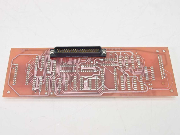 Varian 01002599 MUX Adapter PCB — solder side showing multi-pin D-sub connector and trace routing