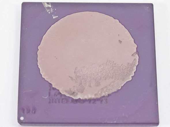 Intel SL22M Pentium 120MHz Socket 7 CPU — bottom (contact/lid) side showing purple ceramic substrate and partial label