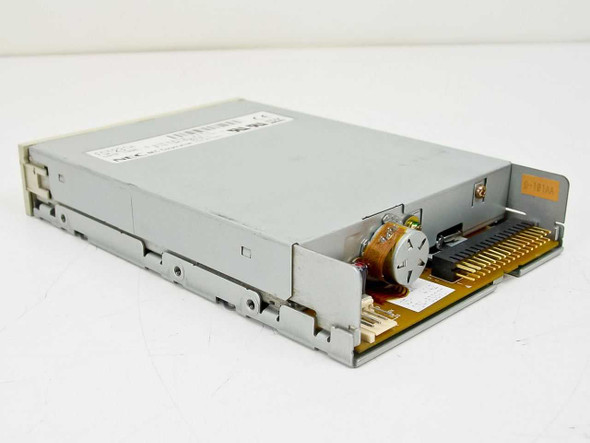 NEC FD1231H floppy disk drive — rear-left angled view showing 34-pin FDD connector, PCB, and spindle motor