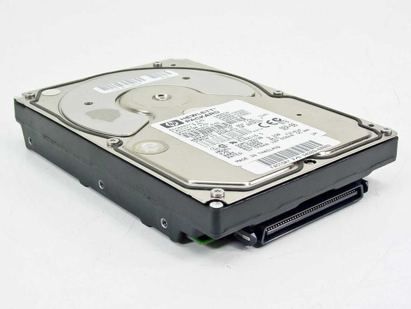 HP D4289-60002 9GB Ultra SCSI hard drive – top/front three-quarter view showing platters and HP label