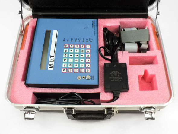 Bell Atlantic MDT Portable MFM Hard Drive Tester in open hard shell carry case with foam cutouts, power adapter, and SCSI ribbon cable neatly stored