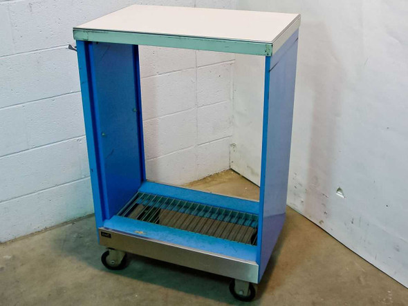 Wright Line blue rolling work cart — front-right three-quarter view showing open cavity, bottom grate shelf, and swivel casters