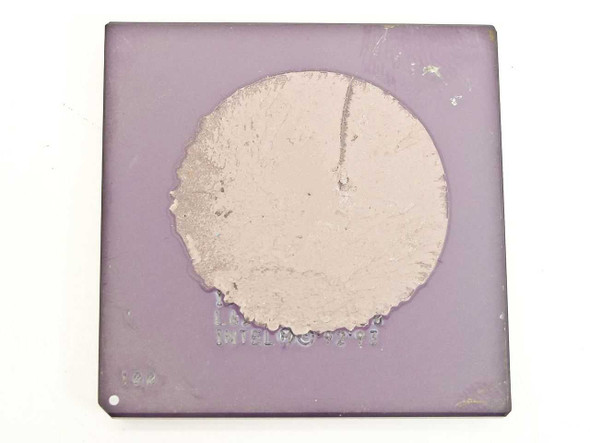 Intel Pentium 100MHz CPU BP80502100 SU099/SSS — top (heat spreader) view showing purple ceramic package