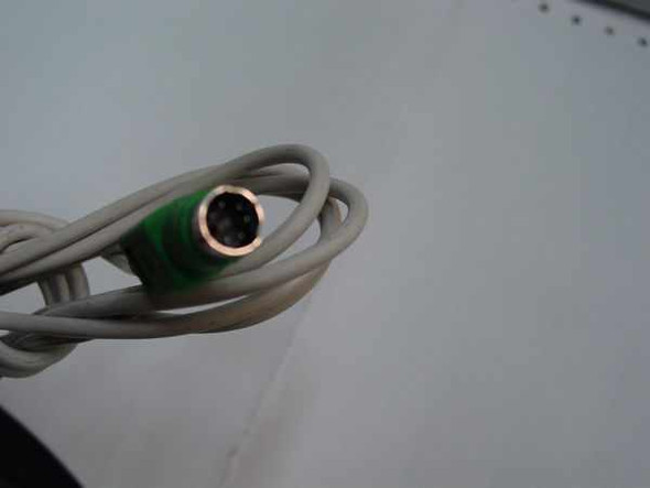 Close-up of green 6-pin Mini-DIN PS/2 connector on Compaq M-S34 mouse cable