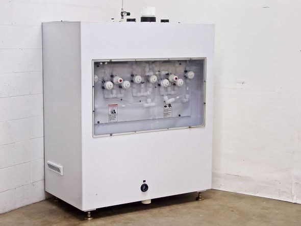 FSI ChemFill Chemical Canister Module rear view showing polypropylene valve manifold panel with multiple solenoid valves and tubing connections