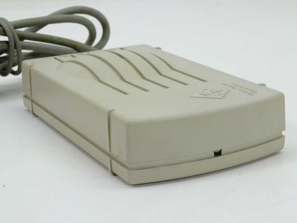 Global Village TelePort Bronze A861 modem – top view showing ribbed beige enclosure and attached cable
