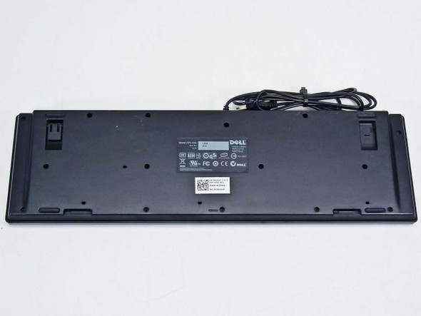 Dell N242F L30U keyboard — bottom view showing label, two fold-out feet, and Dell logo