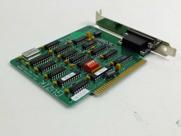Guzik RWA XMIT ISA board IBM 30127 – angled top view showing component side, DIP ICs, red DIP switch bank, and bracket-mounted DB-15 connector