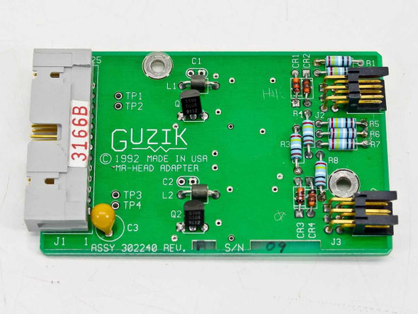 Guzik 302240 MR-Head Adapter Card PCB front side showing GUZIK logo, copyright 1992 Made in USA silkscreen, test points TP1–TP4, inductors L1–L2, transistor Q2, resistor array, and gold-pin edge connectors J1 and J3