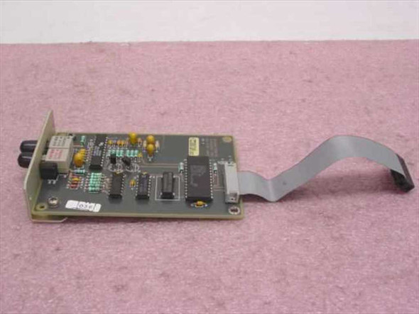 Cabletron SPIM-F2 9000170-02 fiber optic module rear PCB view showing component side with ribbon cable attached