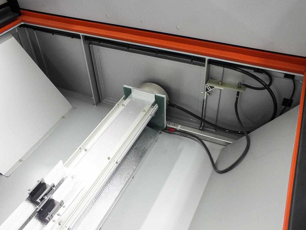 Yamashita Denso PXS-0855MP — interior chamber showing Xenon lamp assembly, stepper motor positioning mechanism, and cable bundle routed through chamber wall