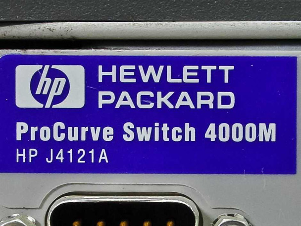Close-up of Hewlett-Packard ProCurve Switch 4000M HP J4121A model label on front chassis panel