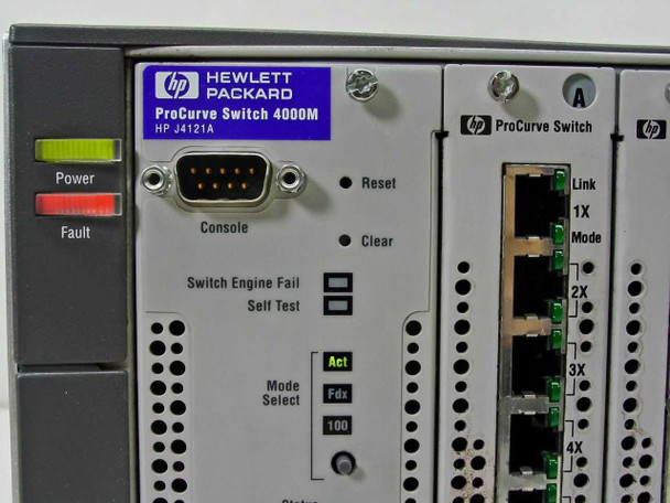 HP J4121A ProCurve Switch 4000M switch engine module close-up showing DB-9 console port, Reset and Clear buttons, Power and Fault LEDs, and Mode Select indicator