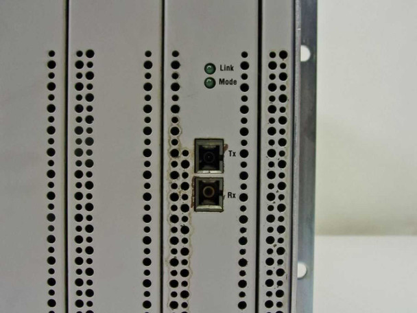 HP J4113A Gigabit-SX module close-up showing SC fiber Tx and Rx ports with Link and Mode LEDs