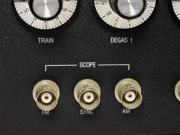 Close-up of Scope BNC connectors labeled FM, Sync, and AM on front panel lower section