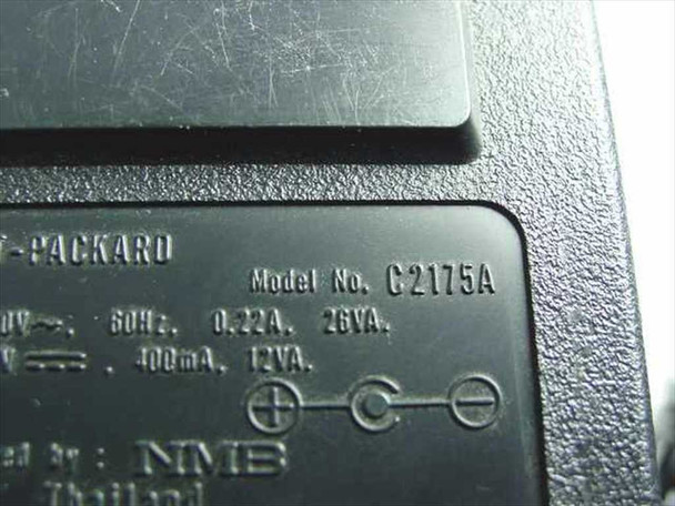 HP C2175A label close-up showing Model No. C2175A, 30VDC 400mA output, 120V 60Hz 0.22A input, NMB manufacture, Thailand