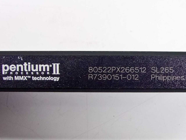 Intel Pentium II SL265 CPU – side label showing part number 80522PX266512, stepping SL265, revision R7390151-012, Philippines origin and MMX technology marking
