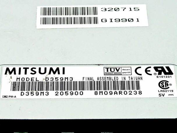 Mitsumi D359M3 model label closeup showing model number D359M3, part number 205900, assembled in Taiwan, 5V rating, TÜV and UL certifications