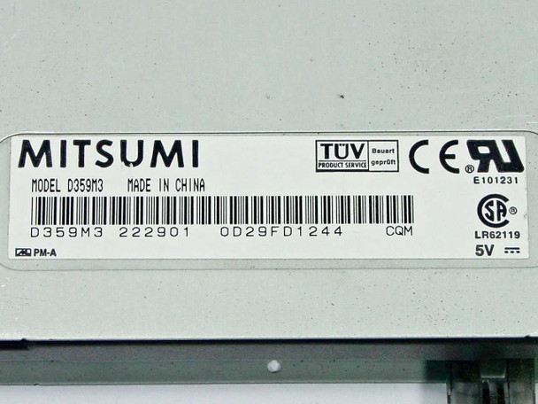 Mitsumi D359M3 bottom label showing model number D359M3, serial 222901, Made in China, TUV, CE, UL, and CSA certifications, 5V rating