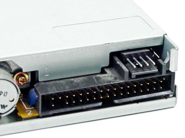 Mitsumi D359M3 floppy drive – close-up of rear 34-pin IDC data connector and 4-pin power connector interface