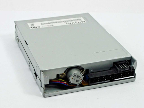 Mitsumi D359M3 floppy drive rear-angle view showing 34-pin data connector and 4-pin power connector with motor visible